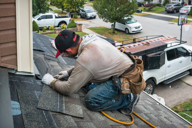 Professional Roofing technician working in Portsmouth, NH